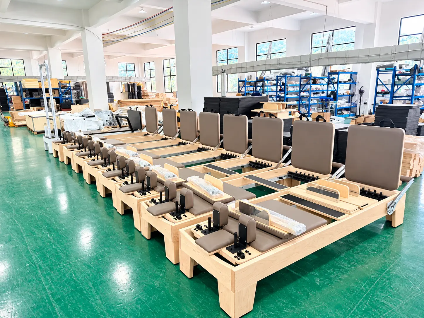 Pilates Reformers In A Modern Workshop
