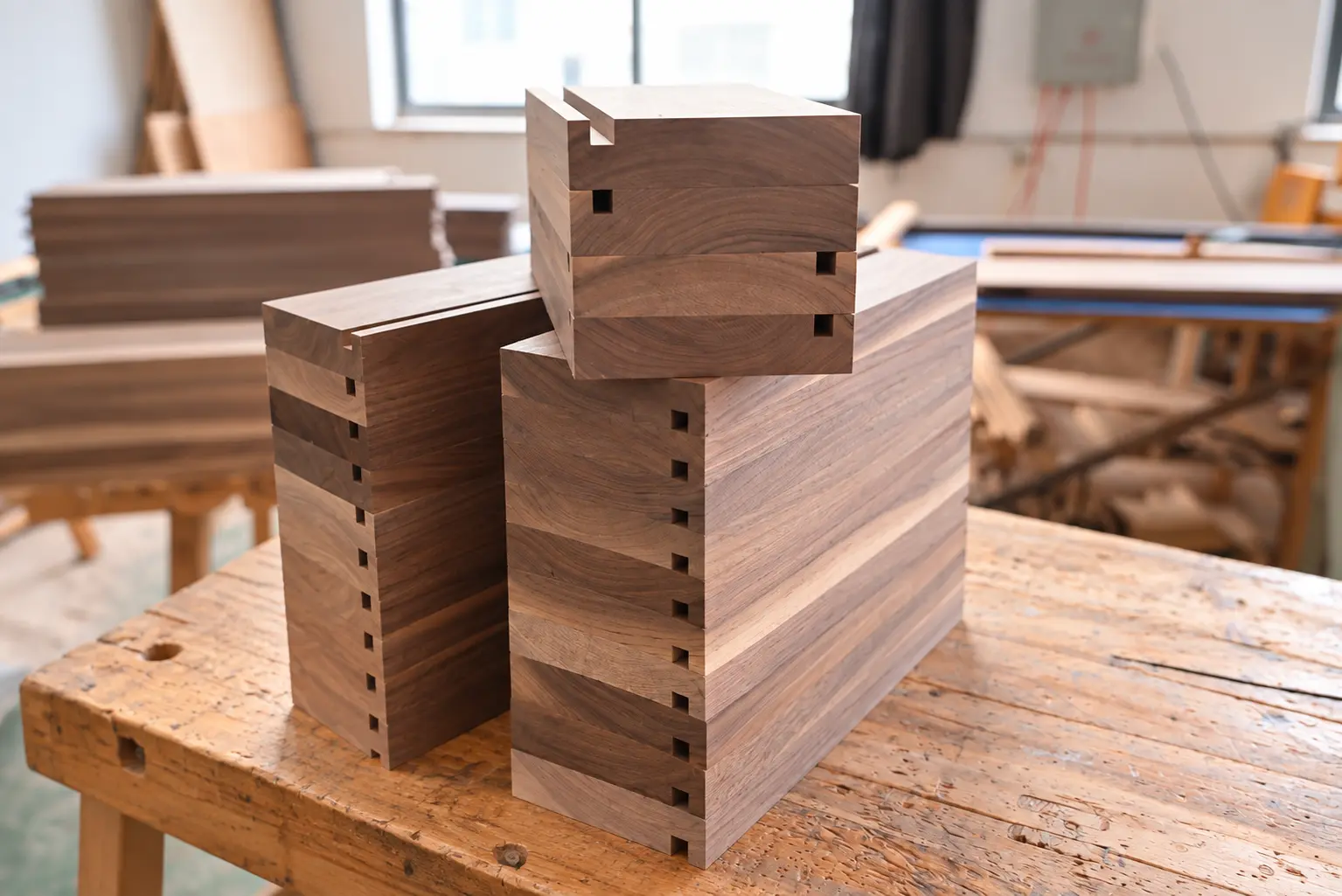 Walnut Joinery Blocks In Workshop Light